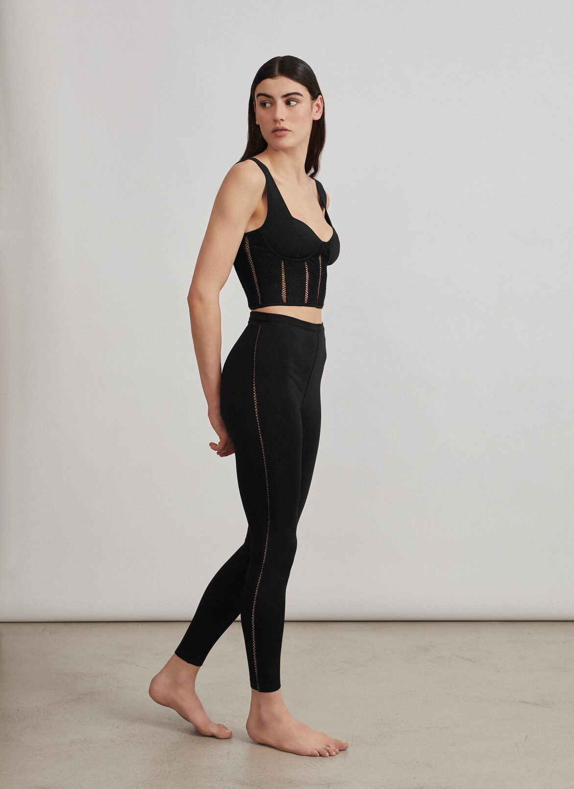 Cropped bustier in technical knit ALAÏA BLACK CROPPED BUSTIER IN TECHNICAL KNIT